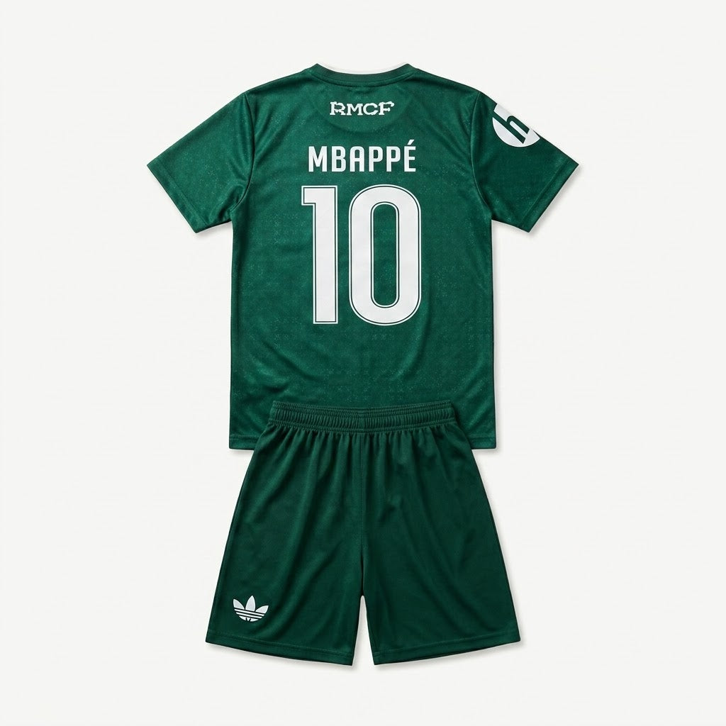 A dark green soccer kit set featuring a short-sleeve jersey and matching shorts. The back of the jersey displays 'MBAPPÉ 10' in white, with 'RMCP' printed at the collar and a white Adidas logo on the right leg of the shorts.
